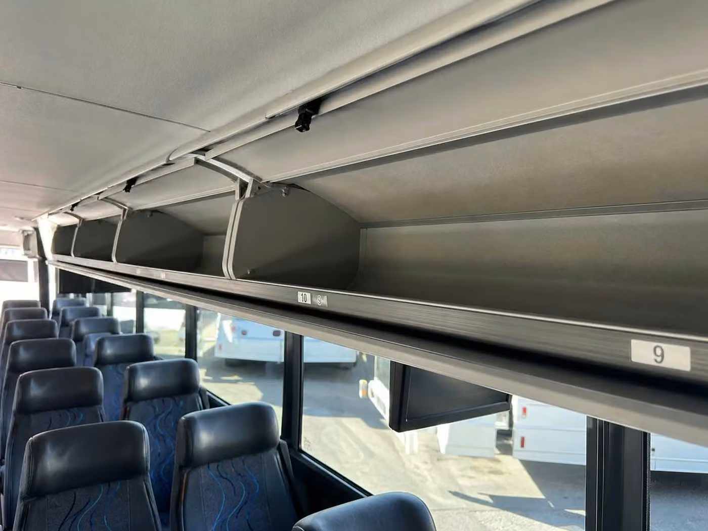 alabaster 18 passenger minibus overhead storage