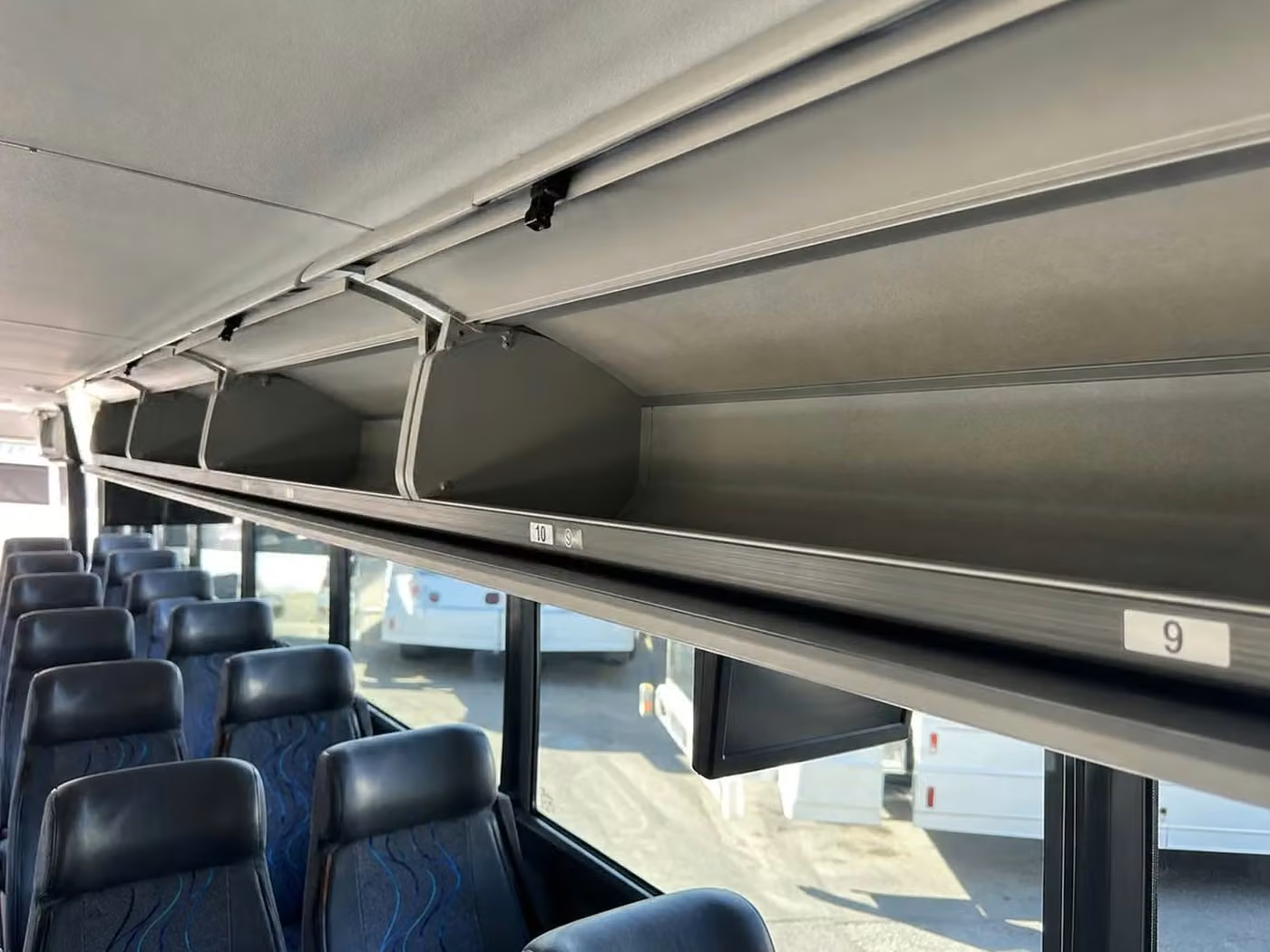 alabaster 28 passenger minibus overhead storage
