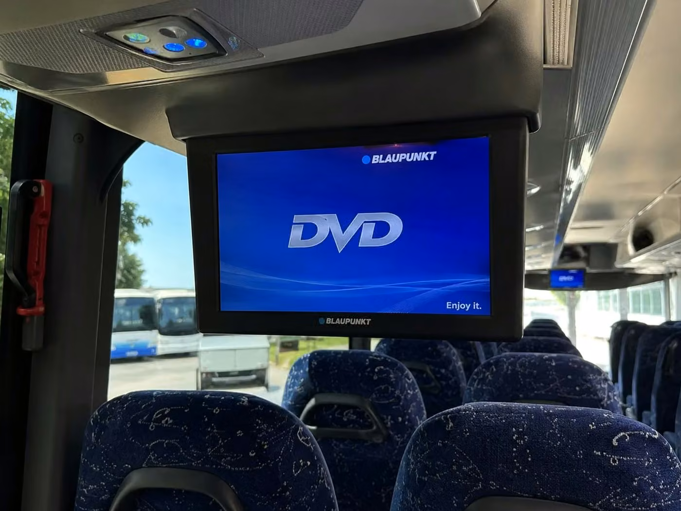 alabaster 56 passenger charter bus tvs